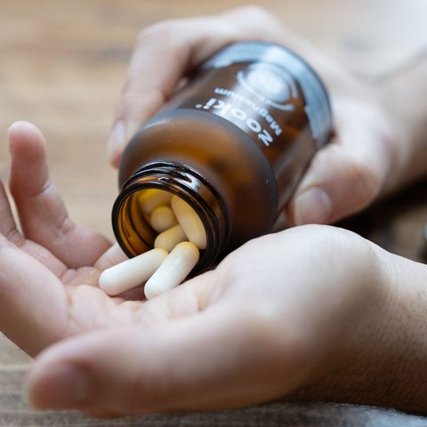 Zooki Magnesium capsules poured into a hand